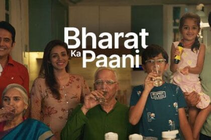 A symbolic image from ZeroB’s ‘Bharat Ka Paani’ campaign showing a diverse group of people—urban workers, rural families, children, and elders—gathered around a clean water source with the Indian map in the background, representing ZeroB’s mission to deliver safe drinking water across the nation.