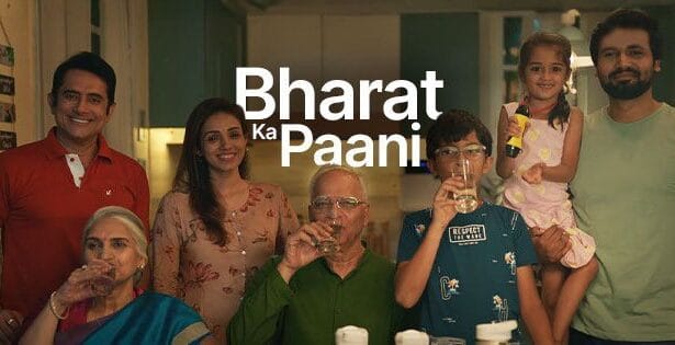 A symbolic image from ZeroB’s ‘Bharat Ka Paani’ campaign showing a diverse group of people—urban workers, rural families, children, and elders—gathered around a clean water source with the Indian map in the background, representing ZeroB’s mission to deliver safe drinking water across the nation.