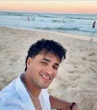 Abhishek Sharma playing an explosive lofted shot during the 3rd T20 international match between India and New Zealand, sealing India’s victory.