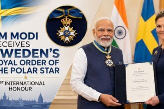 Prime Minister Narendra Modi receiving Sweden’s Royal Order of the Polar Star during an official ceremony, standing beside Crown Princess Victoria with Indian and Swedish flags in the background.